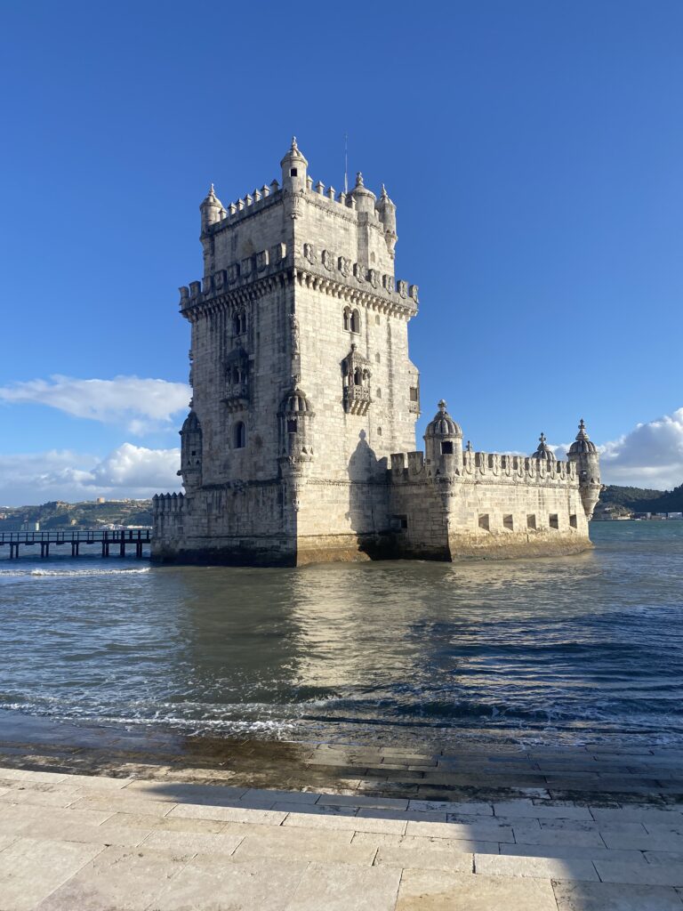 Belem Tower surrounded by water during the afternoon